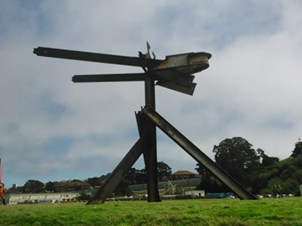 The "head" part weighs six tons & swivels freely in the wind. I've only ever seen it facing west, though. 
